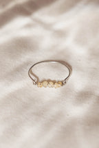 Twist of Light Ring